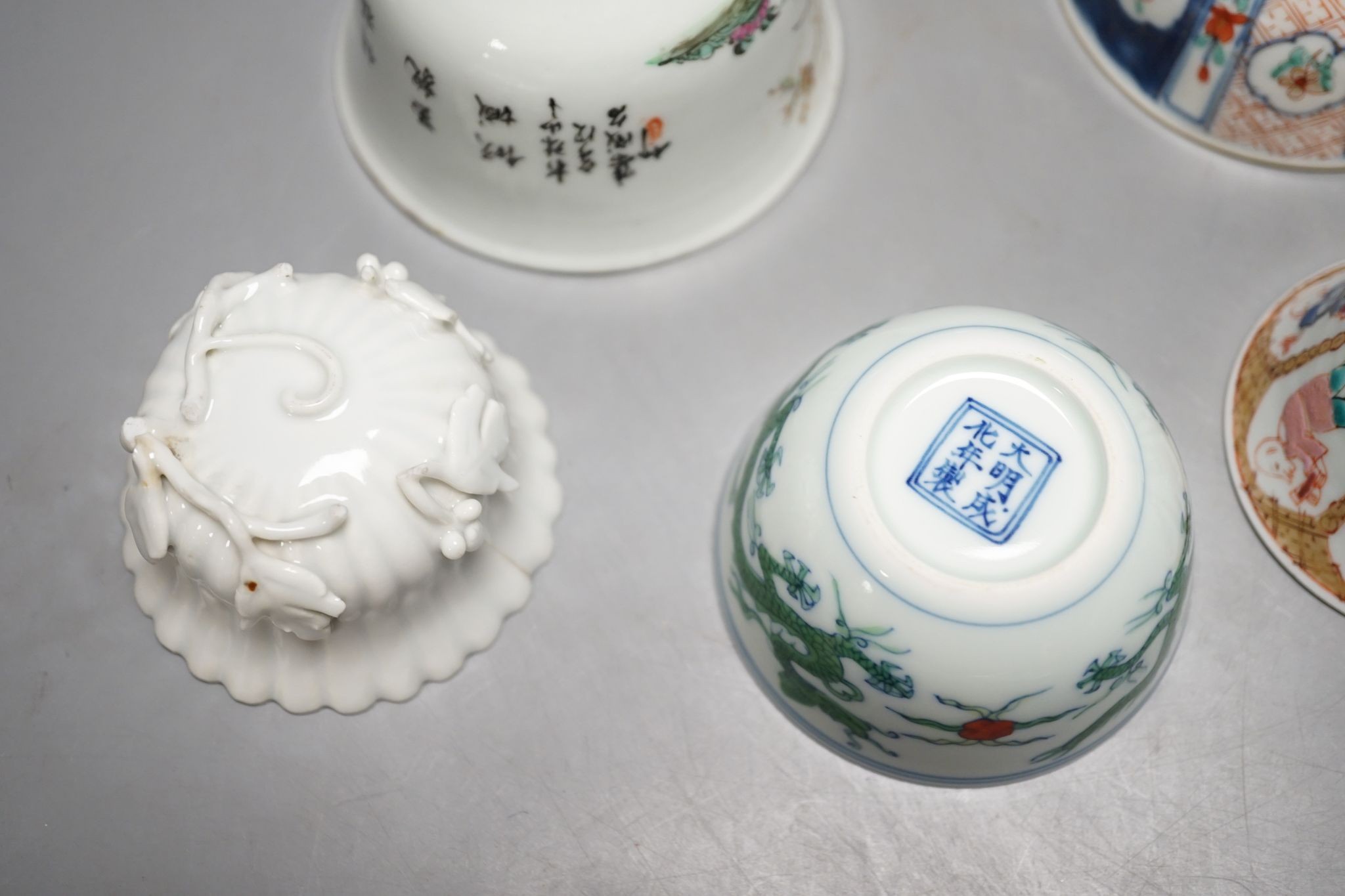 Nine Chinese porcelain tea bowls, tallest 6 cm.